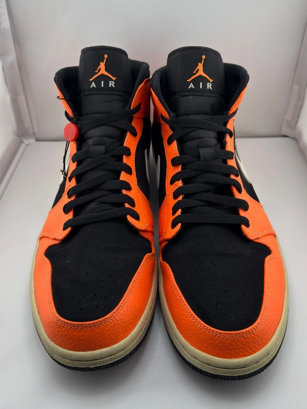 Jordan Black and Orange Mid-Top Sneakers with Cream Swoosh